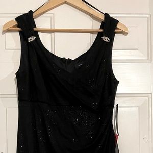 R & M Richard’s Black slip under and sheer sparkles on top. Size 12